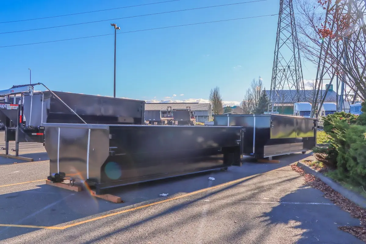 Roll-off dumpster ready for waste disposal at job site for Construction Dumpster Rental in North Springfield